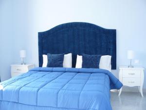 Posteľ alebo postele v izbe v ubytovaní Hotel Villaclara