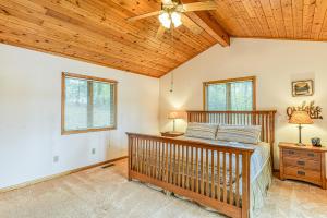a bedroom with a bed and a wooden ceiling at Life is Good in Mineral