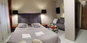 Posteľ alebo postele v izbe v ubytovaní 317 w ROYAL TULI SAND prywatny APARTAMENT przy plaży z aneksem kuchennym