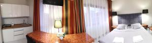 Kuchyňa alebo kuchynka v ubytovaní 317 w ROYAL TULI SAND prywatny APARTAMENT przy plaży z aneksem kuchennym