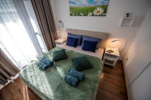Postel nebo postele na pokoji v ubytování Lovely apartman- free parking