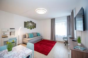 Televízia a/alebo spoločenská miestnosť v ubytovaní Lovely apartman- free parking