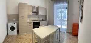 Kuchyňa alebo kuchynka v ubytovaní Catania Apartment Borgo Suite Autonomous