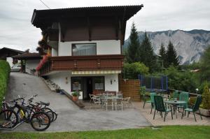 a house with bikes parked in front of it at Gästehaus Annabell und Barbara in Sautens