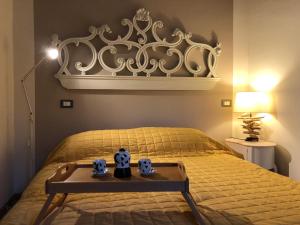 A bed or beds in a room at La Magnolia