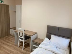 Posteľ alebo postele v izbe v ubytovaní Hotel Aljan