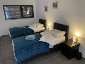 Ένα ή περισσότερα κρεβάτια σε δωμάτιο στο Casa Felino +41 φωτογραφίες