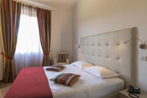 Voodi või voodid majutusasutuse Hotel Settentrionale Esplanade toas