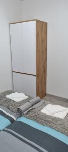 two mattresses sitting on the floor in a room at Apartament UniBal Szczecinek in Szczecinek