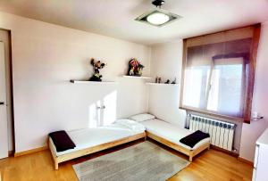 A bed or beds in a room at CASA YLENIA