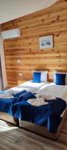 Voodi või voodid majutusasutuse Guest House Edelweiss toas