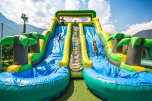 a water park with two inflatable slides at Hotel Campagnola in Riva del Garda
