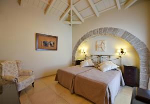 Posteľ alebo postele v izbe v ubytovaní Angelica Traditional Boutique Hotel
