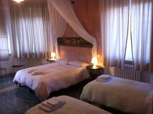 Кровать или кровати в номере B&B Amerigo Vespucci