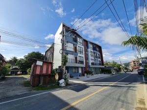 a building on the side of a street at B3 HOUSE in Kamala Beach