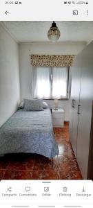 Ліжко або ліжка в номері Apartamento en San Juan de L'arena