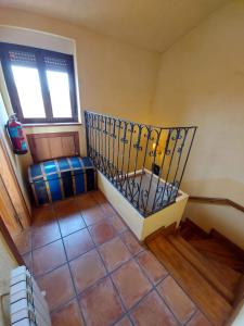 Postel nebo postele na pokoji v ubytování Casa Rural El Callejo
