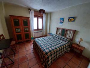 Postel nebo postele na pokoji v ubytování Casa Rural El Callejo