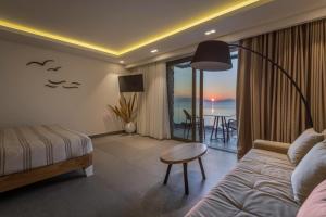 Postel nebo postele na pokoji v ubytování NISSEA Boutique Hotel