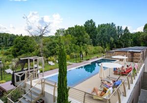 a view of a pool at a resort at Borgo Stazione Bike Inn in Valeggio sul Mincio