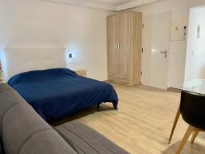 Posteľ alebo postele v izbe v ubytovaní Arguineguin Beach Lux Solarium Sky