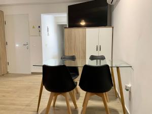 Televízia a/alebo spoločenská miestnosť v ubytovaní Arguineguin Beach Lux Solarium Sky