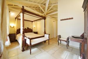 Posteľ alebo postele v izbe v ubytovaní Angelica Traditional Boutique Hotel