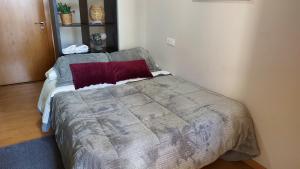 A bed or beds in a room at Ultreia