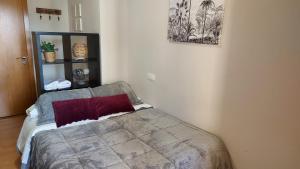 A bed or beds in a room at Ultreia