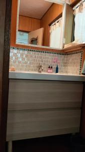 Kuchyň nebo kuchyňský kout v ubytování AKUA inn + 28 fotografií