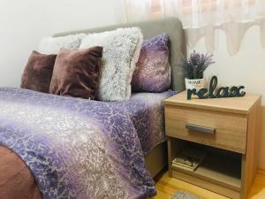Postel nebo postele na pokoji v ubytování Apartmani D&S