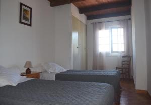 Postel nebo postele na pokoji v ubytování A Rossa Location + 21 fotografií