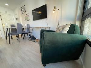TV a/nebo společenská místnost v ubytování DREAM SELECT