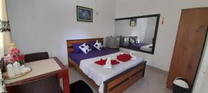 Postel nebo postele na pokoji v ubytování Paradise inn