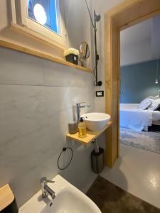 Kúpeľňa v ubytovaní Casimiro Rooms