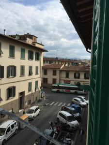 a view of a city street with cars and a bus at Casa Bocchi 3 in Florence