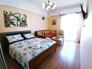 Posteľ alebo postele v izbe v ubytovaní Athens Neoclassical