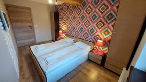 Posteľ alebo postele v izbe v ubytovaní Apartament Widokowy 40