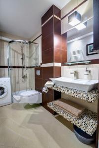 Kúpeľňa v ubytovaní Krynica Apartamenty Centrum Deptak 119