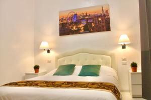 Llit o llits en una habitació de Hotel 900 Toscana