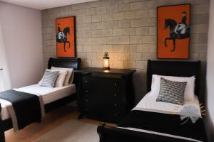 Cama ou camas em um quarto em Vila Pugliesi Hotel Boutique
