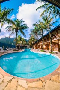 A piscina localizada em Pousada Tambayba ou nos arredores