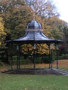 a gazebo in the middle of a park at Traditional apt close to city centre & Hampden in Glasgow
