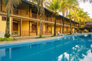 A piscina localizada em Pousada Tambayba ou nos arredores