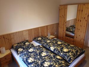 Postel nebo postele na pokoji v ubytování Apartment fewobaerenstein
