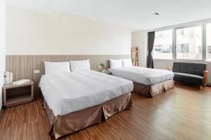 Llit o llits en una habitació de Hotel Brown - Chihkan Branch