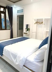 Giường trong phòng chung tại Gia An - hotel in Dalat