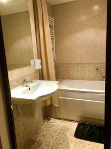 Ванна кімната в Luxury studio
