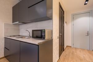 A cozinha ou kitchenette de New Gudauri Atrium 445