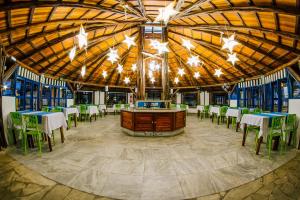 Un restaurante o sitio para comer en Pousada Tambayba